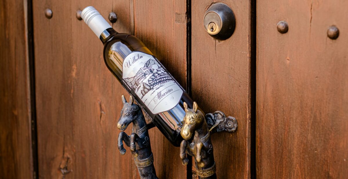 Our 2019 Albariño (Albarino) sitting on a door handle